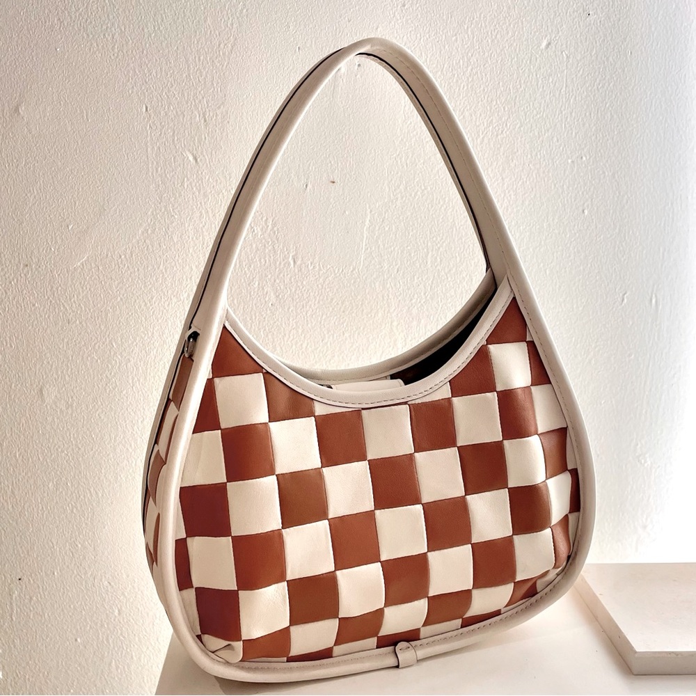 Coachtopia brown and white checkerboard ergo bag
